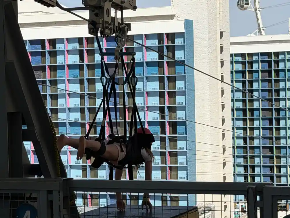 A rider flying flat between the towers of the promenade